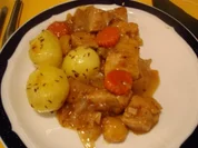 Schweinepfeffer mit Kümmelkartoffeln - Rezept