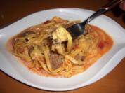 Bratwurst mit Tagliatelle in Tomaten-Ingwer-Sahnesauce - Rezept