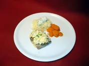 Gratiniertes Schweinefilet "Koblenzer Art" mit Möhrengemüse an Kartoffelschnee - Rezept