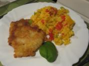Seelachs-Filet im Bierteig auf buntem Paprika-Reis - Rezept