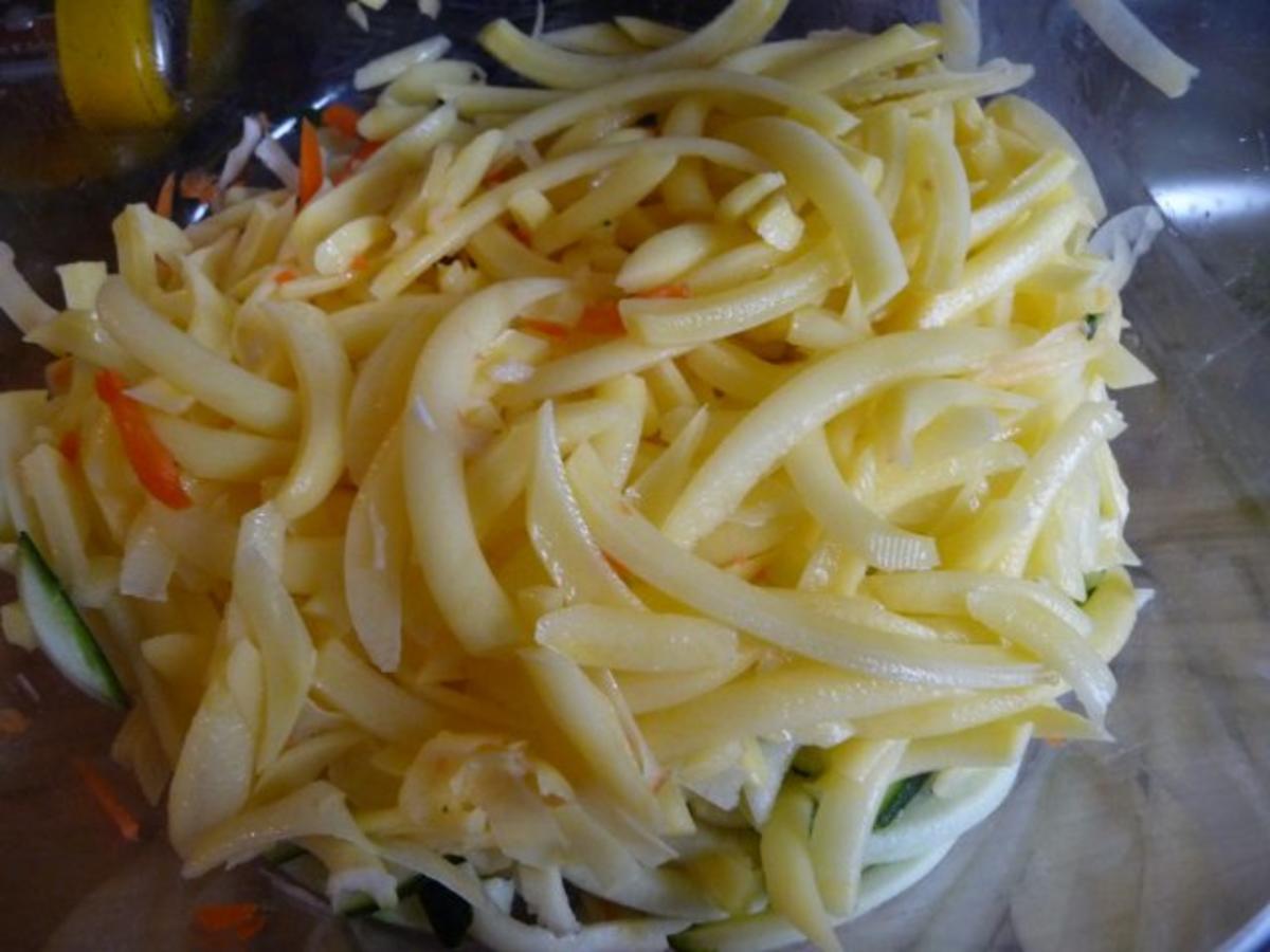 Suppen & Eintöpfe :  Raspeleintopf aus dem Wok - Rezept - Bild Nr. 7