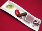 Schokoladentarte und Pistazieneis auf Orangen-Cranberry-Soße und Glühweinschaum - Rezept