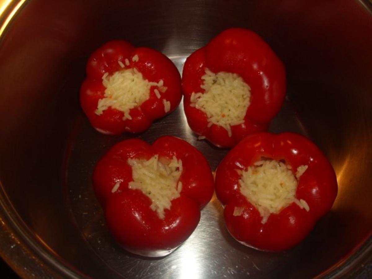 Paprikaschoten gefüllt mit Reis in Tomatensosse - Rezept - Bild Nr. 5