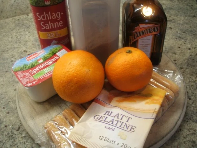 Rezept: Dessert: Schneller Orangenquark auf Löffelbiskuit Bild Nr. 2 Dessert: Schneller Orangenquark auf Löffelbiskuit - Rezept - Bild Nr. 2