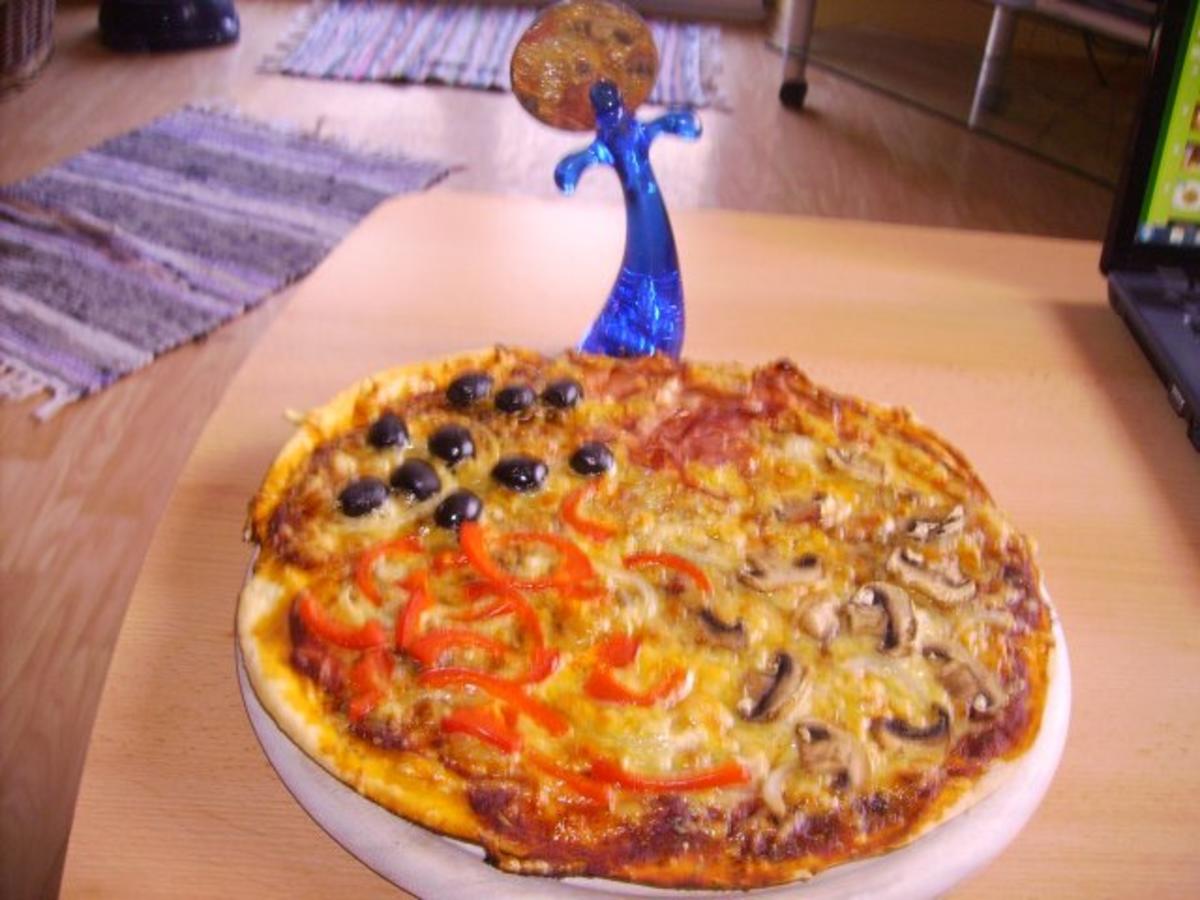 Pizza Quattro Stagioni - Rezept mit Bild - kochbar.de