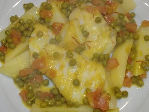 Stockfisch mit Erbsen in Safransauce - Rezept