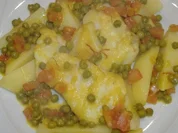 Stockfisch mit Erbsen in Safransauce - Rezept