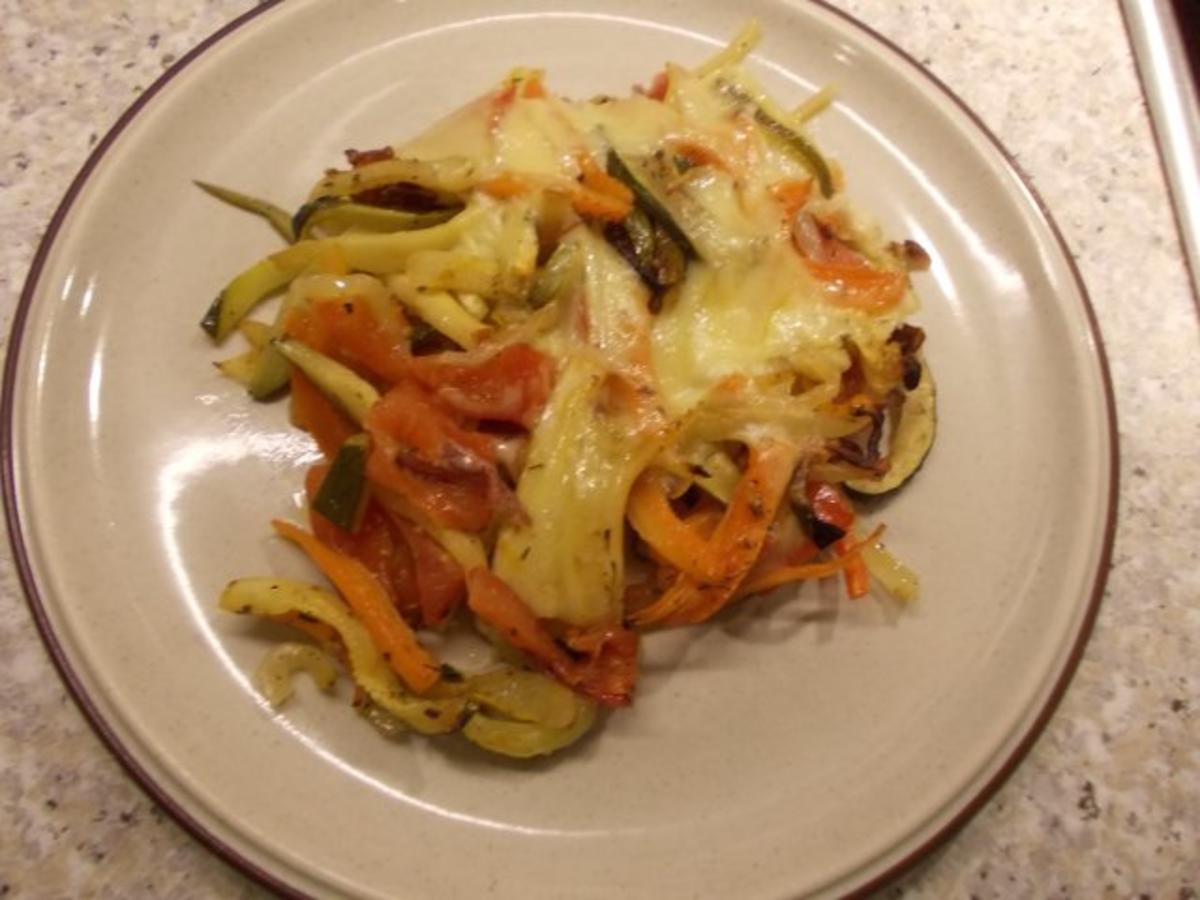 Überbackenes Gemüse mit Schinken und Käse - Rezept