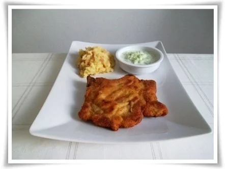 Paniertes Kotelett mit würzigen Stampfkartoffeln und Gurkensalat dazu. - Rezept - Bild Nr. 21