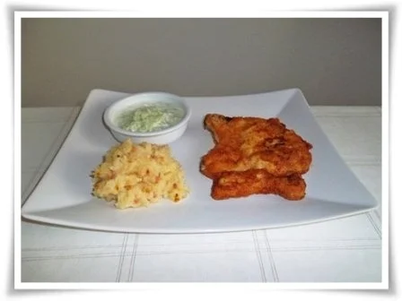 Paniertes Kotelett mit würzigen Stampfkartoffeln und Gurkensalat dazu. - Rezept - Bild Nr. 19
