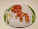 Pizzabrötchen mit Käsehaube - Rezept
