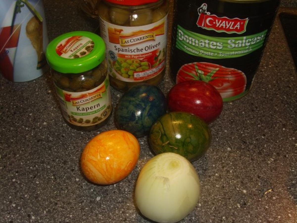 Eier in Tomaten-Kapern Soße - Rezept - Bild Nr. 2