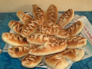 Rezept: Teigtaschen, mit Spinat gefüllt Teigtaschen, mit Spinat gefüllt - Rezept