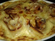 Überbackene Schinken- Nudeln- Schnecken - Rezept