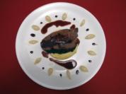 Geschmorte Ochsenschulter mit glasierten Zwiebeln und Zitruspolenta - Rezept