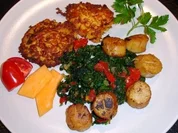 Jakobsmuscheln auf Wurzelspinat mit Kürbisplätzchen - Rezept