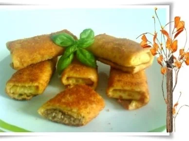 Pfannkuchen, gefüllt, gerollt, paniert und gebraten. - Rezept