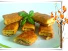 Pfannkuchen, gefüllt, gerollt, paniert und gebraten. - Rezept