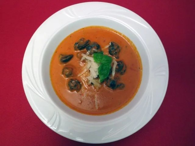 Weinbergschnecken in pikanter Tomatensoße - Rezept