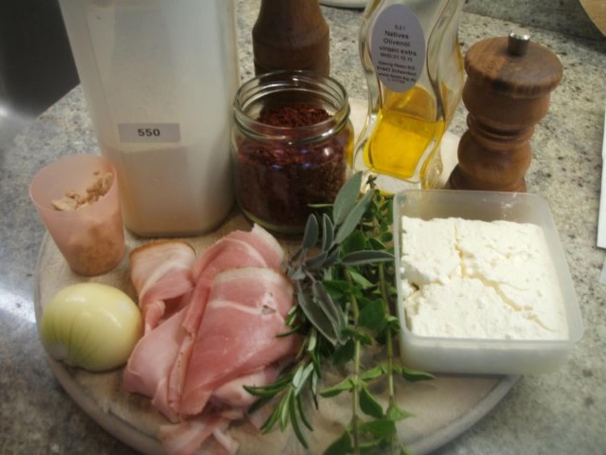 Fingerfood: Kräuterschnecken mit Schafskäsefüllung - Rezept - kochbar.de