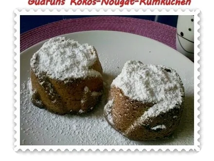 Kuchen: Kokos-Nougat-Rumkuchen - Rezept