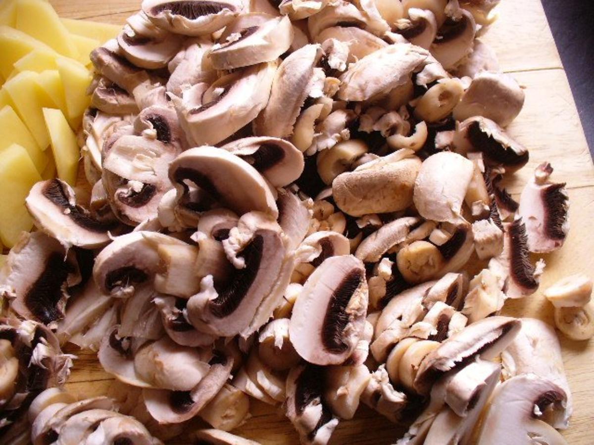 Bratkartoffeln mit Champignons - Rezept - kochbar.de