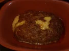 Hackbraten mit Käse gefüllt im Römertopf - Rezept