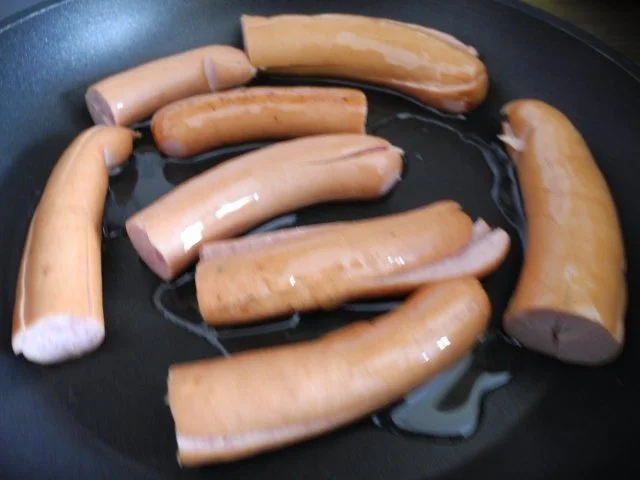 Aus dem Backofen : Raspelauflauf mit Wurstkraken und frischem Salat - Rezept - Bild Nr. 11