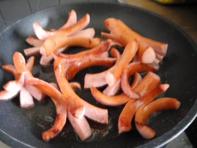 Aus dem Backofen : Raspelauflauf mit Wurstkraken und frischem Salat - Rezept - Bild Nr. 13