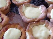 Muffins gefüllt mit Roter Grütze - Rezept