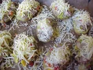 Rezept: Überbackene Kartoffelhälften Überbackene Kartoffelhälften - Rezept