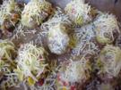 Überbackene Kartoffelhälften - Rezept
