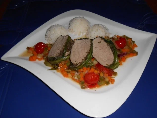 Filet im Bärlauchmantel auf Gemüse und Basmatireis - Rezept