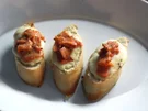 Rezept: Gratinierte Kräuterbaguettes mit Lachs Gratinierte Kräuterbaguettes mit Lachs - Rezept