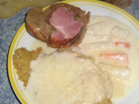 Kassler in Krustenbrotmantel mit Schwarzwurzelgemüse und Rösti - Rezept