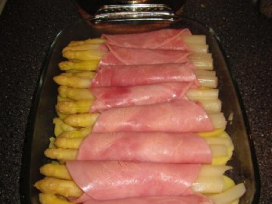 überbackene Spargel-Schinken-Röllchen in Hollandaise - Rezept - kochbar.de