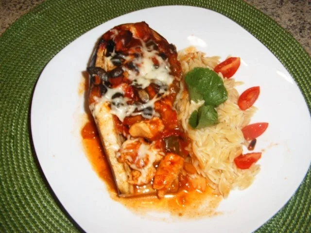 Aubergine mit Hähnchenbrust gefüllt - Rezept