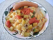 Unter 30 Minuten : Fussili an Tomaten-Paprika-Soße mit Zucchini und Tomaten - Rezept