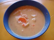 Kokossuppe mit Hähnchenbrustfilet und Möhrenblüten - Rezept