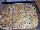 Flammkuchen mit Käse überbacken - Rezept