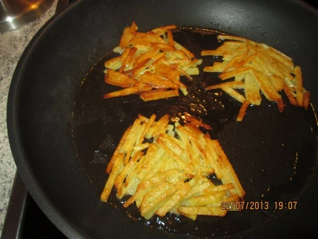 Rezept: Champigon-Geschnetzeltes mit Kartoffelrösti Bild Nr. 14 Champigon-Geschnetzeltes mit Kartoffelrösti - Rezept - Bild Nr. 14