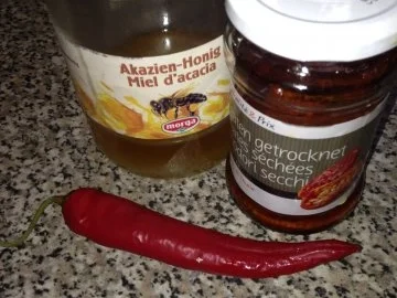 Perlhuhn an Chilli-Honig-Knoblauch mit Reis und Erbsen - Rezept - Bild Nr. 3