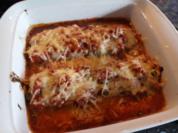 Fischfilets in Tomatensauce mit Käse überbacken - Rezept