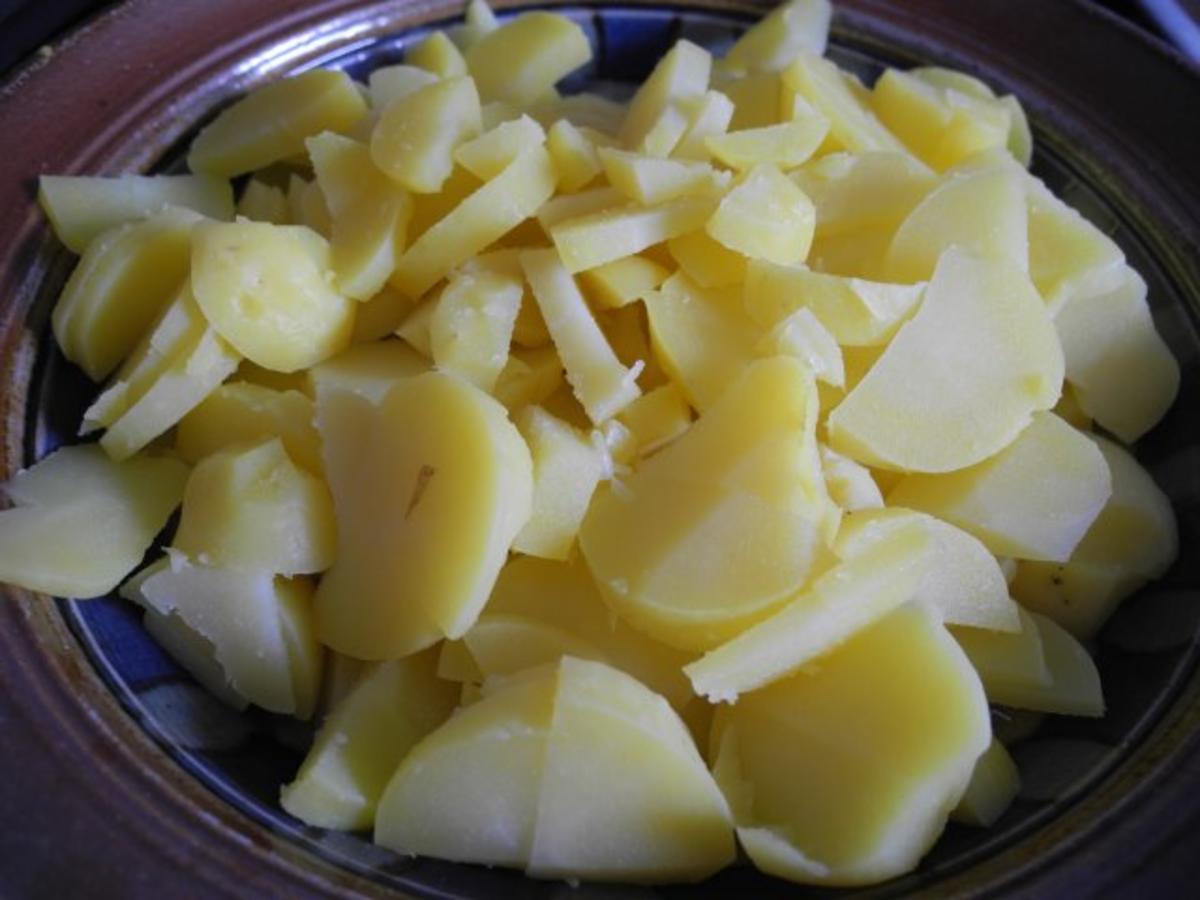 Linsen mit Saitenwürstchen und Bratkartoffeln mit Ei - Rezept - Bild Nr. 10