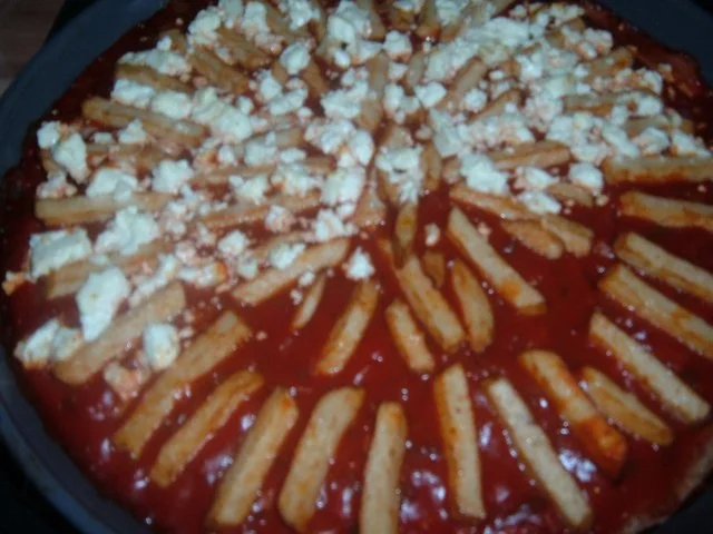 Rezept: Pizza : Vollkorn mit Hähnchen und Feta Bild Nr. 2 Pizza : Vollkorn mit Hähnchen und Feta - Rezept - Bild Nr. 2