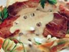 Schnitzel auf Kapernsoße gebettet - Rezept