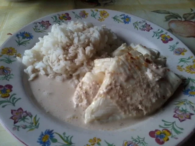 Fisch mit Butter-Weinbrandsauce und Reis - Rezept