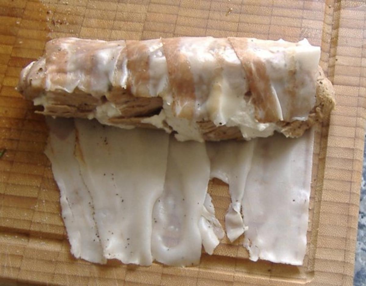 Schweinefilet gefüllt mit Ziegenfrischkäse im Zucchinimantel auf Kartoffelrucolastampf - Rezept - Bild Nr. 6