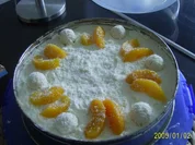 Kuchen: Kokos-Konfekt-Torte mit Pfirsichen - Rezept