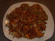 Pfifferlinge mit gebratenen Knödelscheiben - Rezept